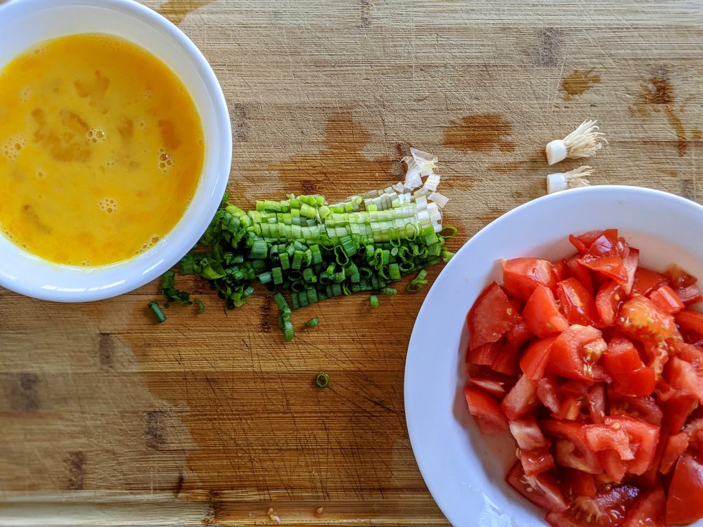 prepared ingredients for tomato egg stir-fry